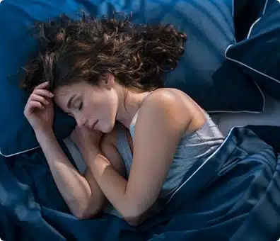 Women with long hair sleeping on her right side